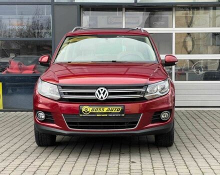 Червоний Фольксваген Тігуан, об'ємом двигуна 2 л та пробігом 120 тис. км за 11800 $, фото 1 на Automoto.ua