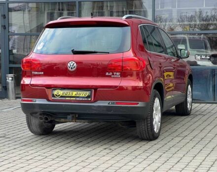 Червоний Фольксваген Тігуан, об'ємом двигуна 2 л та пробігом 120 тис. км за 11800 $, фото 6 на Automoto.ua