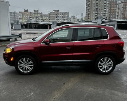 Красный Фольксваген Тигуан, объемом двигателя 1.98 л и пробегом 224 тыс. км за 11500 $, фото 2 на Automoto.ua
