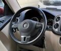 Червоний Фольксваген Тігуан, об'ємом двигуна 2 л та пробігом 120 тис. км за 11800 $, фото 14 на Automoto.ua