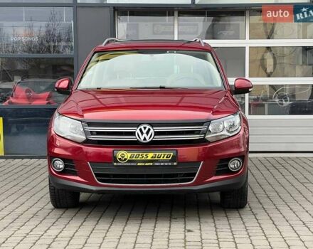 Красный Фольксваген Тигуан, объемом двигателя 1.98 л и пробегом 120 тыс. км за 11800 $, фото 1 на Automoto.ua