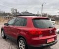 Красный Фольксваген Тигуан, объемом двигателя 2 л и пробегом 198 тыс. км за 8999 $, фото 4 на Automoto.ua