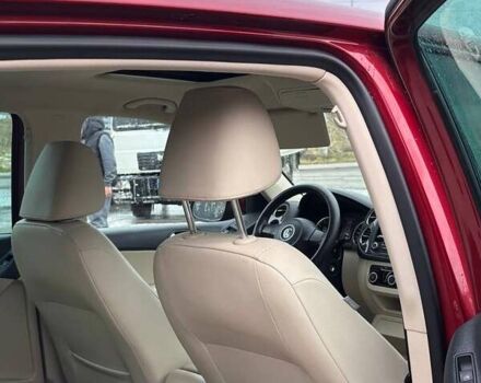 Красный Фольксваген Тигуан, объемом двигателя 2 л и пробегом 198 тыс. км за 8999 $, фото 11 на Automoto.ua