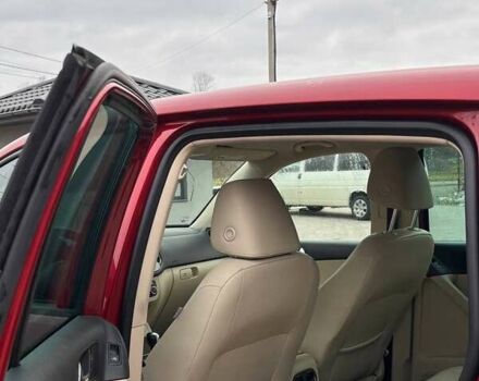 Красный Фольксваген Тигуан, объемом двигателя 2 л и пробегом 198 тыс. км за 8999 $, фото 7 на Automoto.ua