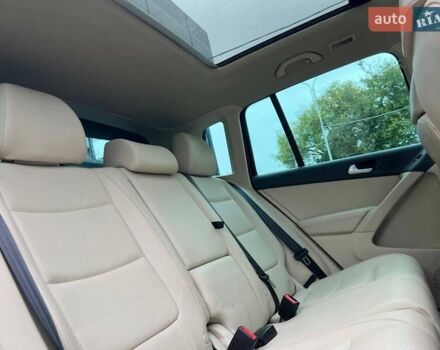 Красный Фольксваген Тигуан, объемом двигателя 1.98 л и пробегом 175 тыс. км за 13800 $, фото 8 на Automoto.ua