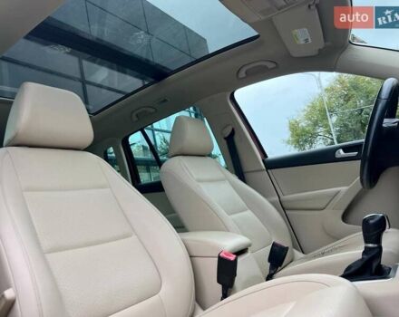 Красный Фольксваген Тигуан, объемом двигателя 1.98 л и пробегом 175 тыс. км за 13800 $, фото 7 на Automoto.ua