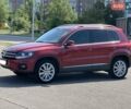 Червоний Фольксваген Тігуан, об'ємом двигуна 2 л та пробігом 91 тис. км за 13500 $, фото 4 на Automoto.ua