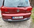 Красный Фольксваген Тигуан, объемом двигателя 2 л и пробегом 123 тыс. км за 267 $, фото 2 на Automoto.ua