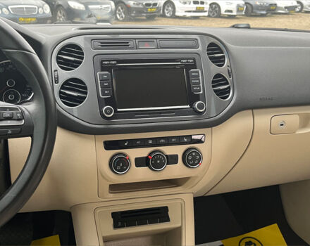 Красный Фольксваген Тигуан, объемом двигателя 2 л и пробегом 231 тыс. км за 12999 $, фото 24 на Automoto.ua