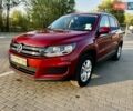 Красный Фольксваген Тигуан, объемом двигателя 1.98 л и пробегом 91 тыс. км за 13000 $, фото 1 на Automoto.ua