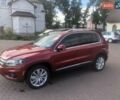 Красный Фольксваген Тигуан, объемом двигателя 2 л и пробегом 177 тыс. км за 12700 $, фото 1 на Automoto.ua