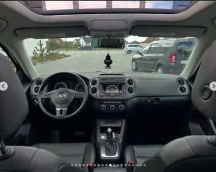 Красный Фольксваген Тигуан, объемом двигателя 2 л и пробегом 205 тыс. км за 12000 $, фото 10 на Automoto.ua