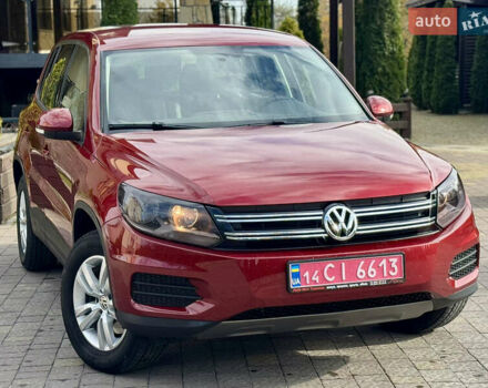 Красный Фольксваген Тигуан, объемом двигателя 1.98 л и пробегом 160 тыс. км за 12000 $, фото 1 на Automoto.ua