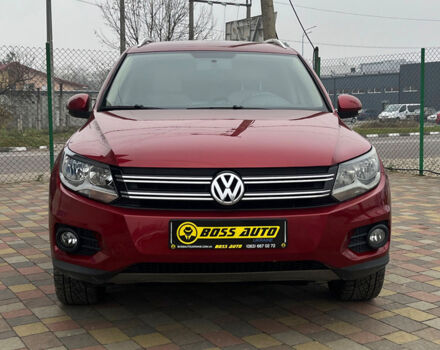 Красный Фольксваген Тигуан, объемом двигателя 2 л и пробегом 231 тыс. км за 12999 $, фото 1 на Automoto.ua