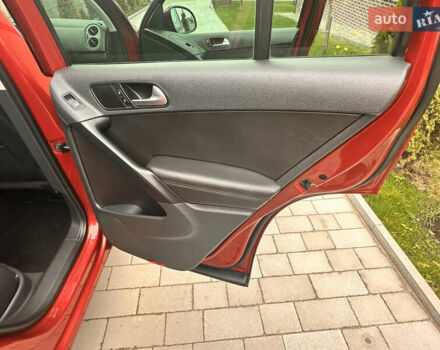 Червоний Фольксваген Тігуан, об'ємом двигуна 1.98 л та пробігом 167 тис. км за 11300 $, фото 17 на Automoto.ua
