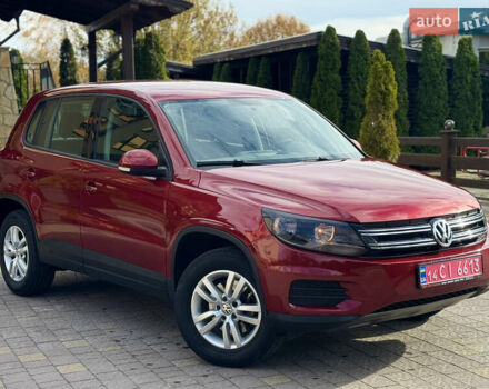 Красный Фольксваген Тигуан, объемом двигателя 1.98 л и пробегом 160 тыс. км за 12000 $, фото 2 на Automoto.ua