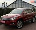 Красный Фольксваген Тигуан, объемом двигателя 1.98 л и пробегом 181 тыс. км за 13499 $, фото 1 на Automoto.ua