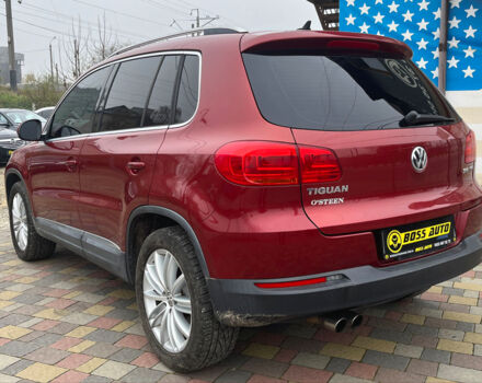 Красный Фольксваген Тигуан, объемом двигателя 2 л и пробегом 231 тыс. км за 12999 $, фото 4 на Automoto.ua