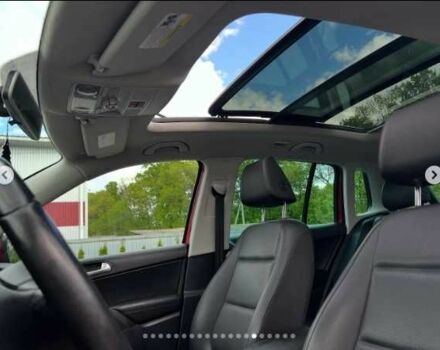 Красный Фольксваген Тигуан, объемом двигателя 2 л и пробегом 205 тыс. км за 12000 $, фото 14 на Automoto.ua