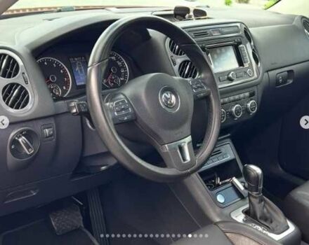 Красный Фольксваген Тигуан, объемом двигателя 2 л и пробегом 205 тыс. км за 12000 $, фото 16 на Automoto.ua