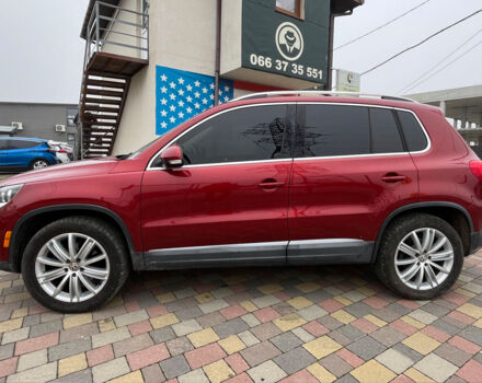 Красный Фольксваген Тигуан, объемом двигателя 2 л и пробегом 231 тыс. км за 12999 $, фото 3 на Automoto.ua