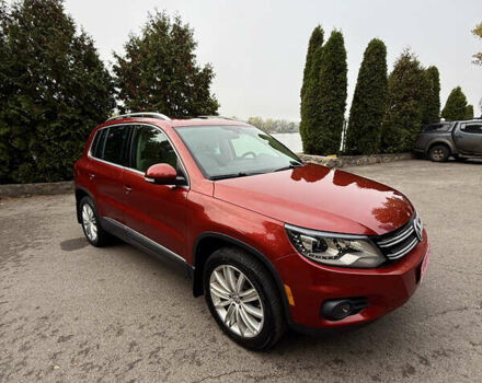 Красный Фольксваген Тигуан, объемом двигателя 2 л и пробегом 162 тыс. км за 14700 $, фото 1 на Automoto.ua