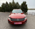 Красный Фольксваген Тигуан, объемом двигателя 2 л и пробегом 162 тыс. км за 14700 $, фото 2 на Automoto.ua