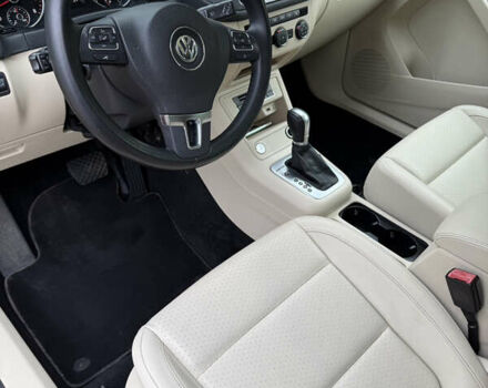 Красный Фольксваген Тигуан, объемом двигателя 2 л и пробегом 162 тыс. км за 14700 $, фото 17 на Automoto.ua