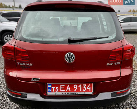 Червоний Фольксваген Тігуан, об'ємом двигуна 2 л та пробігом 140 тис. км за 11100 $, фото 3 на Automoto.ua