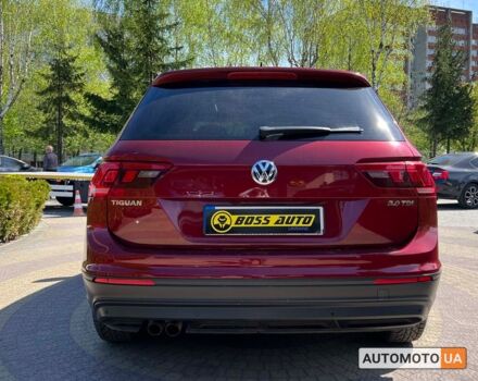Красный Фольксваген Тигуан, объемом двигателя 2 л и пробегом 225 тыс. км за 18700 $, фото 5 на Automoto.ua