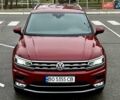 Красный Фольксваген Тигуан, объемом двигателя 1.98 л и пробегом 220 тыс. км за 19900 $, фото 2 на Automoto.ua