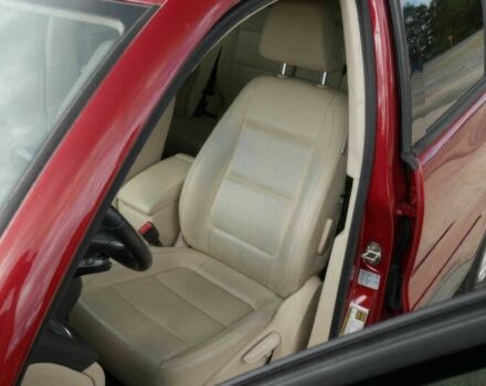 Червоний Фольксваген Тігуан, об'ємом двигуна 2 л та пробігом 79 тис. км за 7200 $, фото 9 на Automoto.ua