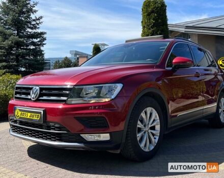 Красный Фольксваген Тигуан, объемом двигателя 2 л и пробегом 225 тыс. км за 18700 $, фото 2 на Automoto.ua