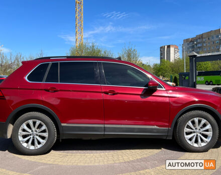 Красный Фольксваген Тигуан, объемом двигателя 2 л и пробегом 225 тыс. км за 18700 $, фото 7 на Automoto.ua