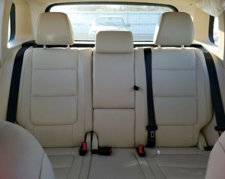 Красный Фольксваген Тигуан, объемом двигателя 2 л и пробегом 73 тыс. км за 10000 $, фото 9 на Automoto.ua