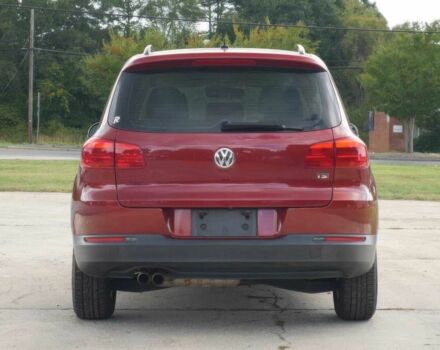 Червоний Фольксваген Тігуан, об'ємом двигуна 2 л та пробігом 80 тис. км за 7200 $, фото 5 на Automoto.ua