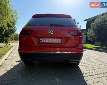 Червоний Фольксваген Тігуан, об'ємом двигуна 2 л та пробігом 133 тис. км за 26400 $, фото 5 на Automoto.ua