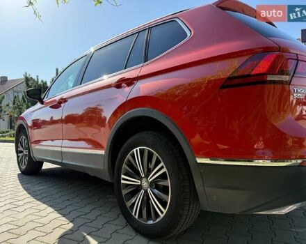 Червоний Фольксваген Тігуан, об'ємом двигуна 2 л та пробігом 133 тис. км за 26400 $, фото 4 на Automoto.ua