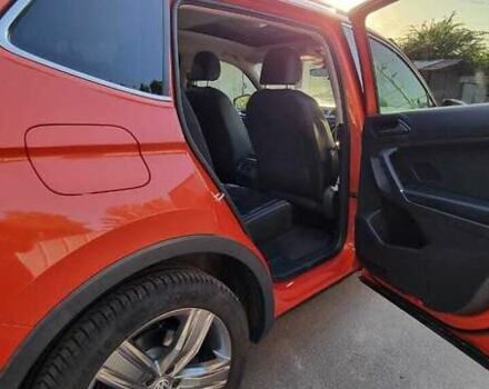 Красный Фольксваген Тигуан, объемом двигателя 1.98 л и пробегом 65 тыс. км за 23500 $, фото 5 на Automoto.ua