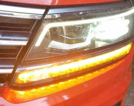 Красный Фольксваген Тигуан, объемом двигателя 1.98 л и пробегом 65 тыс. км за 23500 $, фото 1 на Automoto.ua