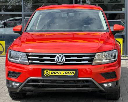 Червоний Фольксваген Тігуан, об'ємом двигуна 2 л та пробігом 127 тис. км за 17700 $, фото 1 на Automoto.ua