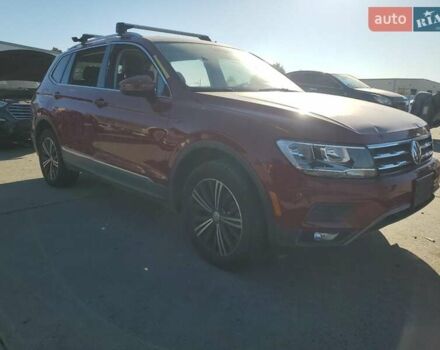 Червоний Фольксваген Тігуан, об'ємом двигуна 1.98 л та пробігом 105 тис. км за 10000 $, фото 4 на Automoto.ua