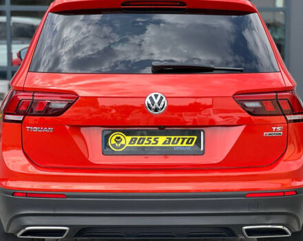 Червоний Фольксваген Тігуан, об'ємом двигуна 2 л та пробігом 127 тис. км за 17700 $, фото 4 на Automoto.ua