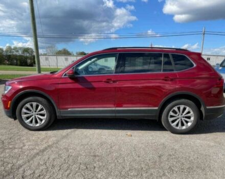 Червоний Фольксваген Тігуан, об'ємом двигуна 2 л та пробігом 49 тис. км за 9850 $, фото 4 на Automoto.ua