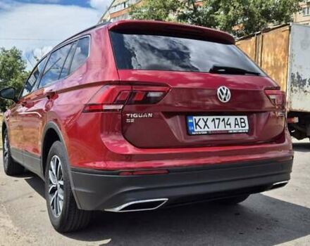 Червоний Фольксваген Тігуан, об'ємом двигуна 1.98 л та пробігом 110 тис. км за 21600 $, фото 1 на Automoto.ua
