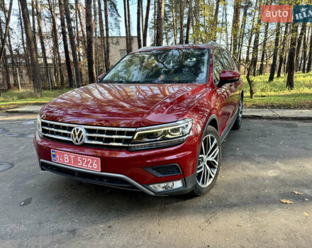 Красный Фольксваген Тигуан, объемом двигателя 2 л и пробегом 91 тыс. км за 18900 $, фото 1 на Automoto.ua