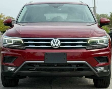 Красный Фольксваген Тигуан, объемом двигателя 2 л и пробегом 40 тыс. км за 11100 $, фото 1 на Automoto.ua