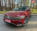Красный Фольксваген Тигуан, объемом двигателя 2 л и пробегом 91 тыс. км за 18900 $, фото 1 на Automoto.ua