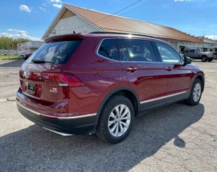 Червоний Фольксваген Тігуан, об'ємом двигуна 2 л та пробігом 49 тис. км за 9850 $, фото 5 на Automoto.ua