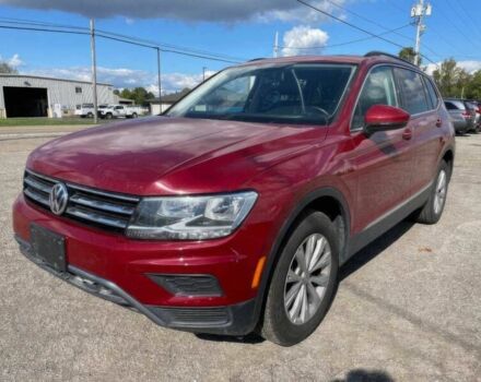 Червоний Фольксваген Тігуан, об'ємом двигуна 2 л та пробігом 49 тис. км за 9850 $, фото 2 на Automoto.ua